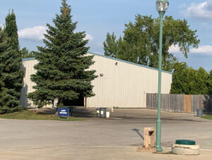 Golf course maintenance building with golf cart storage internet access